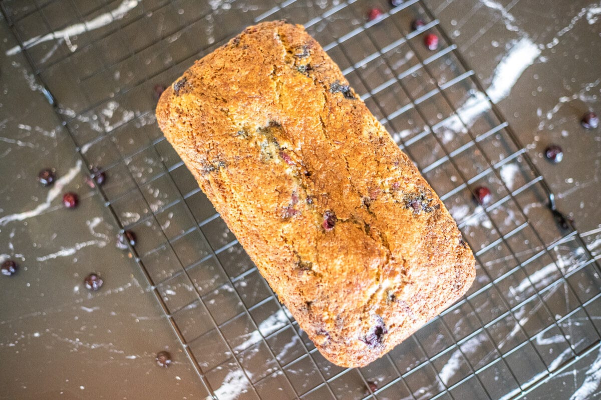top view blueberry banana bread on cooling rack