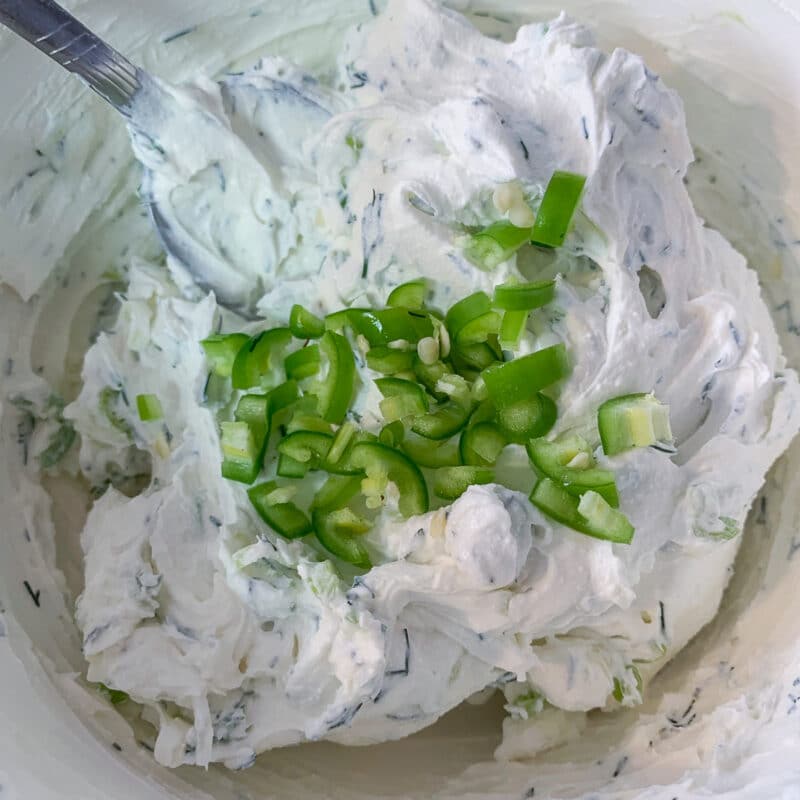 peppers being added to greek Greek yogurt cream cheese
