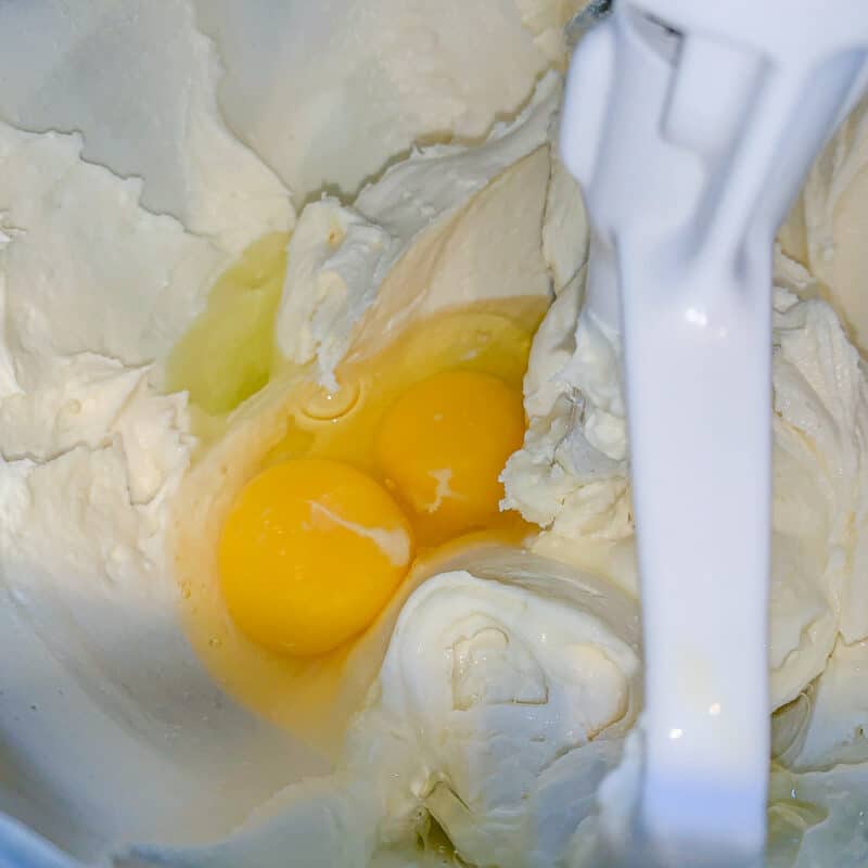eggs beaten into cream cheese