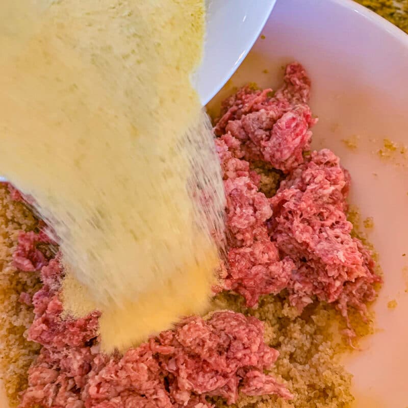 pouring semolina to ground beef