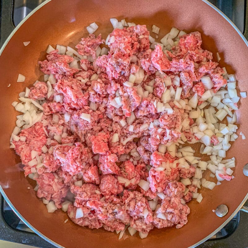 meat and onions in a pan