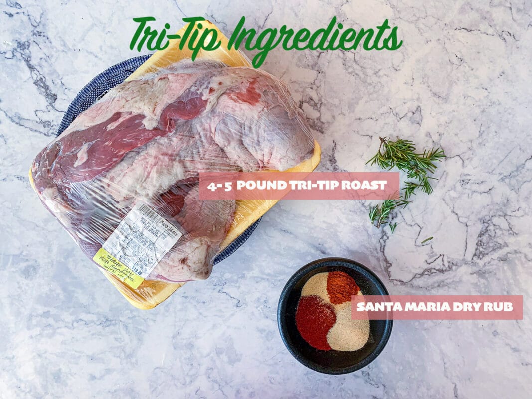 raw tri-tip, spice rub, and fresh rosemary sprig on white marble counter