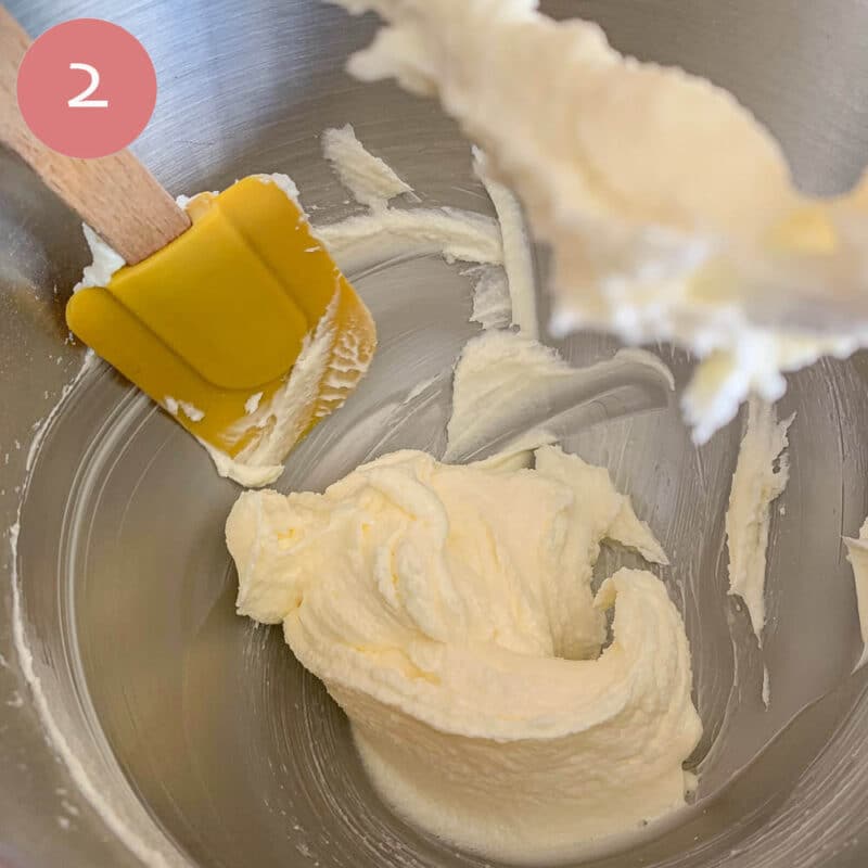 scraping creamed butter for the side of a mixing bowl