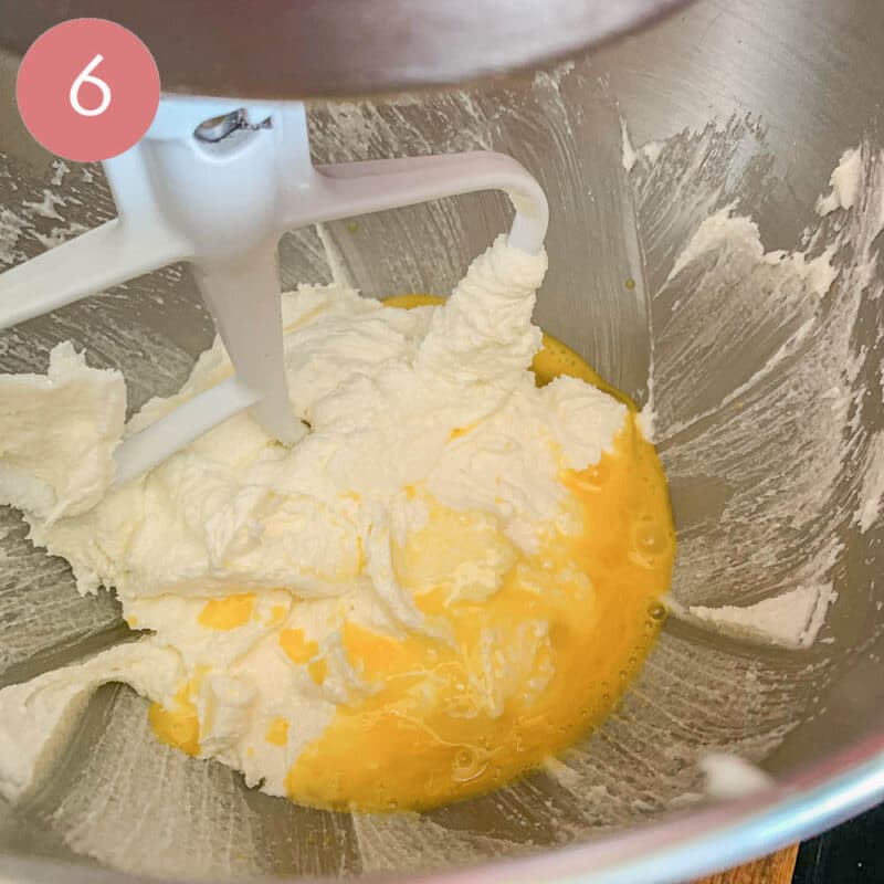 mixing cake batter in a mixing bowl