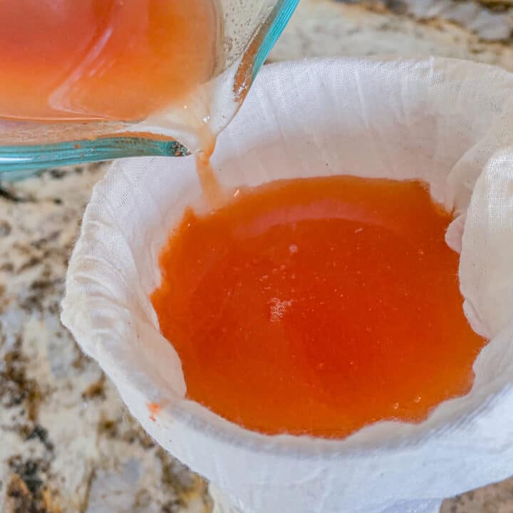 pouring syrup through ha soup bag