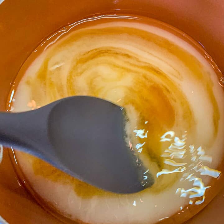 stirring syrup ingredients into a pot