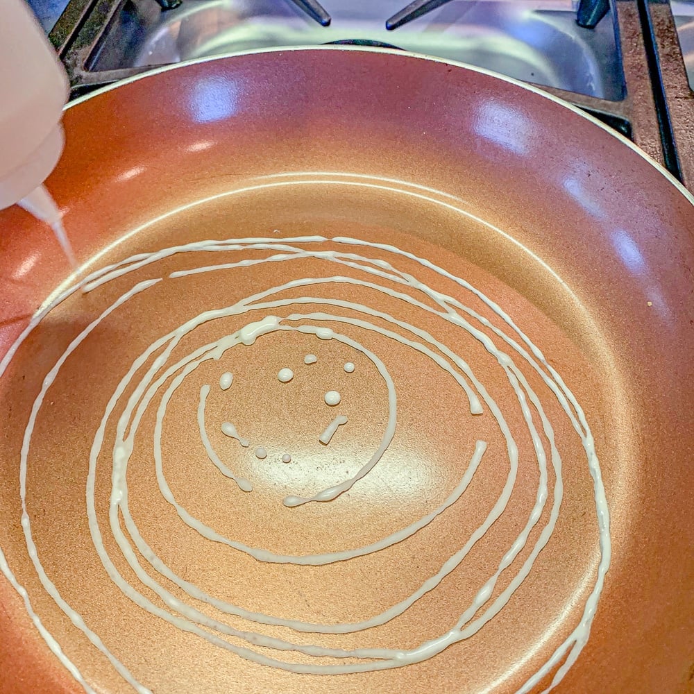 swirling batter in a pan