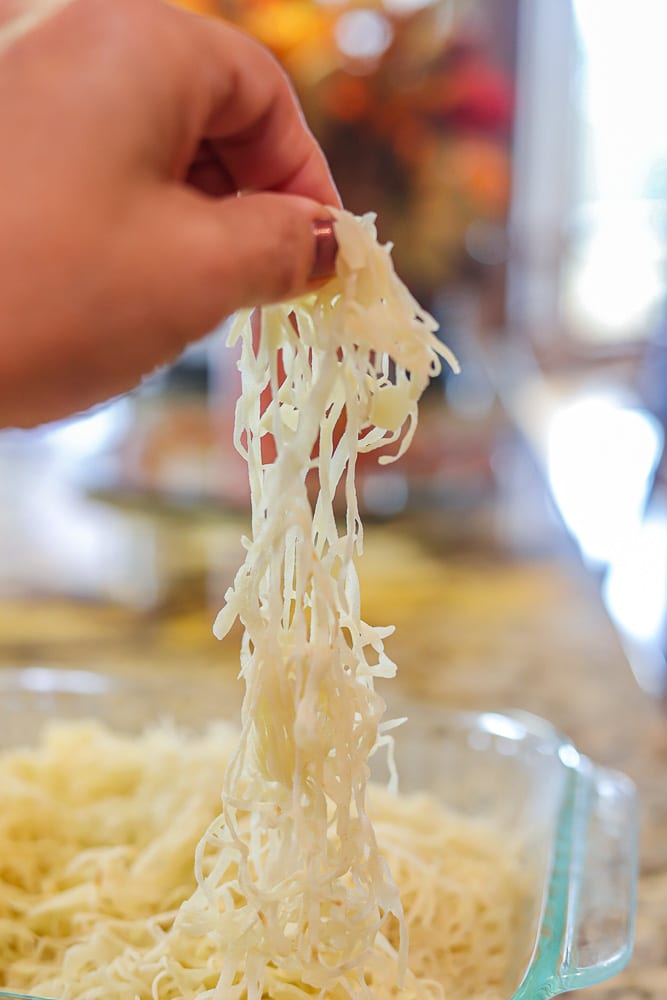 shredded phyllo dough being pulled from dish