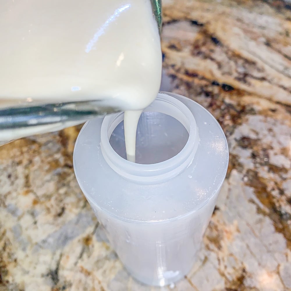 pouring katiafi batter in a squeeze bottle.