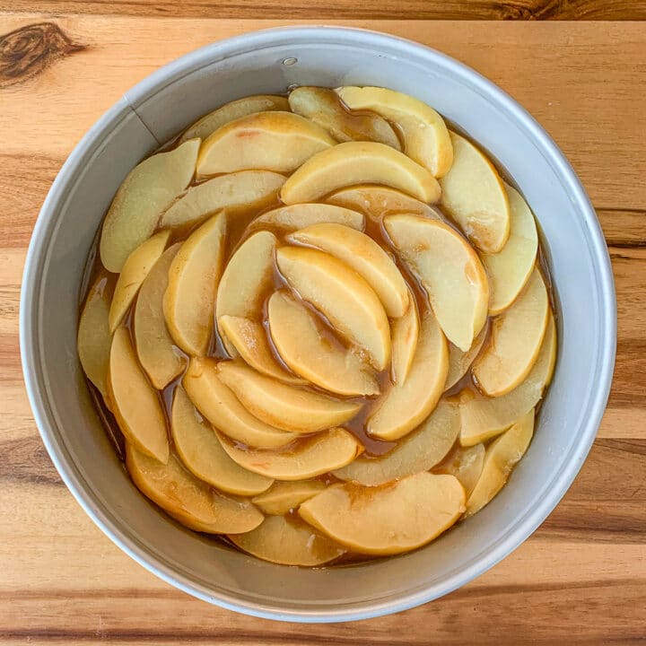 quince sliced and arranged in a round pan