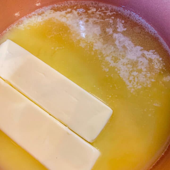2 sticks of butter melting in a pan