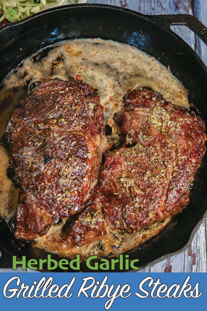 grilled ribeye steaks in a cast iron skillet