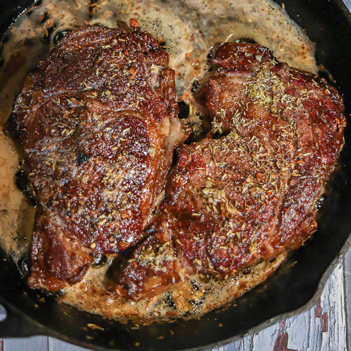 Grilled Ribeyes Basted in Herbed Garlic Butter