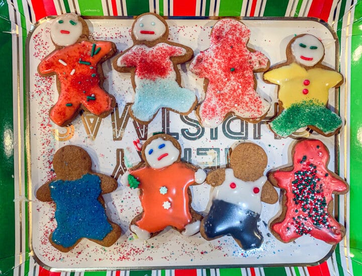 decorated gingerbread men cookies on a christmas plate