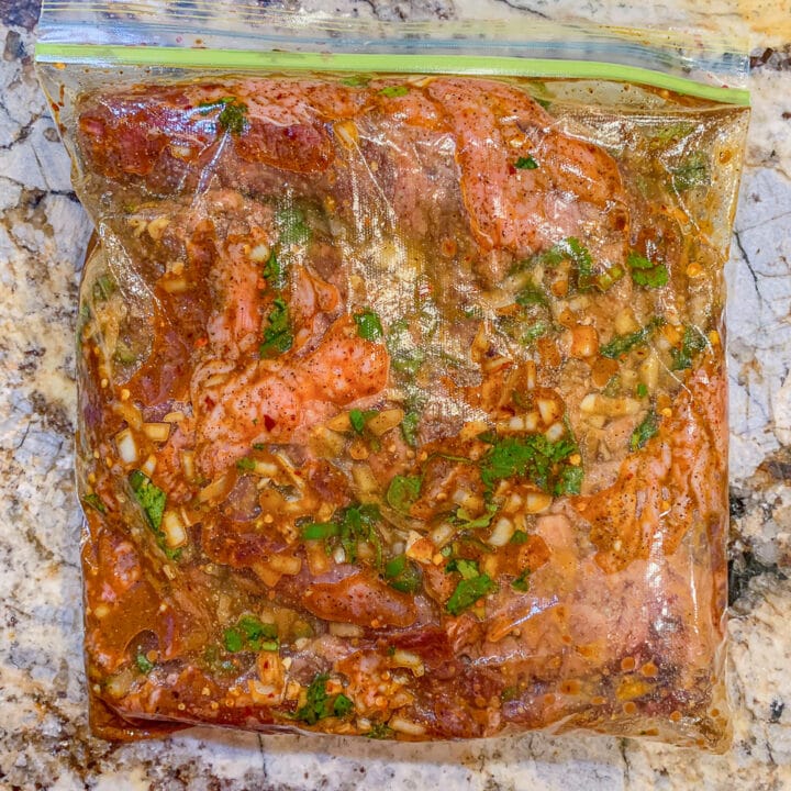 meat and marinade in a plastic bag