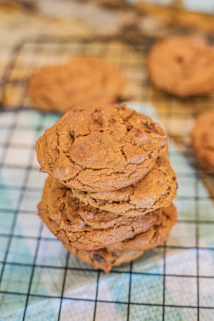 chickpea cookies stacked on a rack