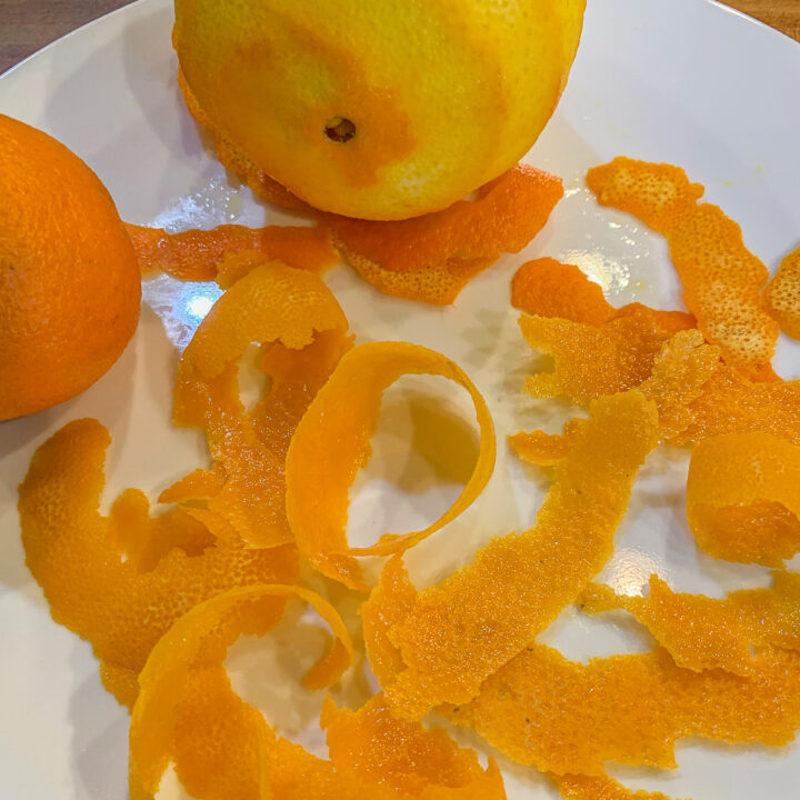orange peels on a white plate