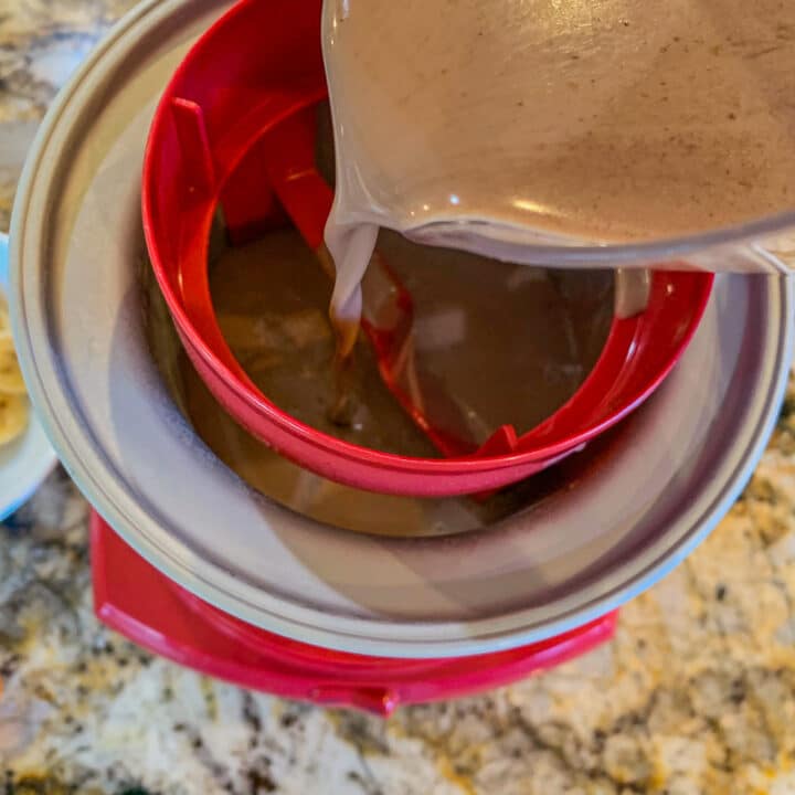 pouring Nutella cream in an ice cream maker