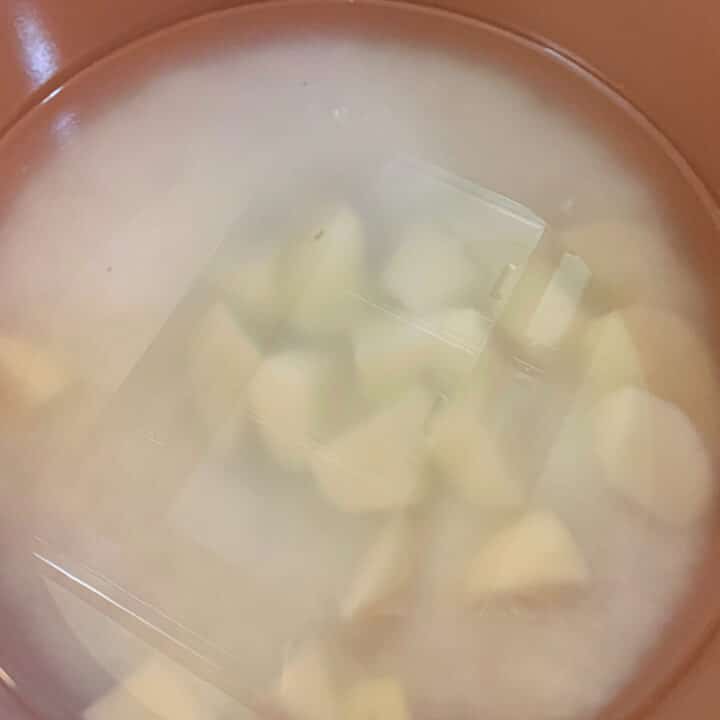 potatoes and rice covered with water