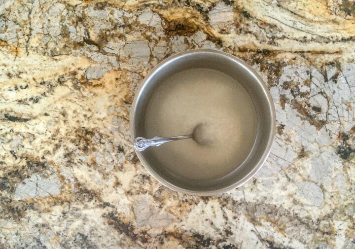 rice soaking in water in a bowl