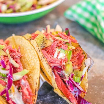 corned beef Irish tacos with a green and white napkin in the background