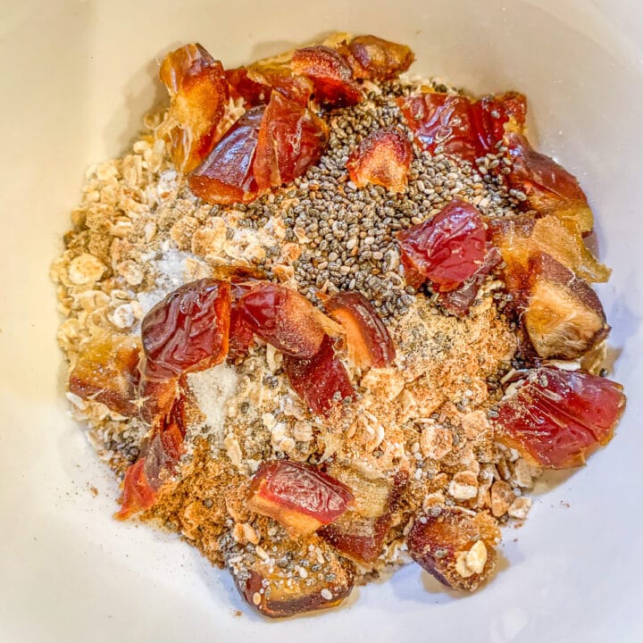 chopped dates, oats, and spices in a bowl