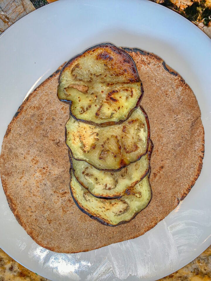 pita bread with sliced eggplant in the center