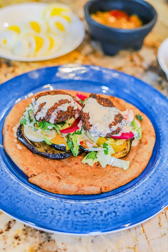 Sabich Sandwich on a blue plate