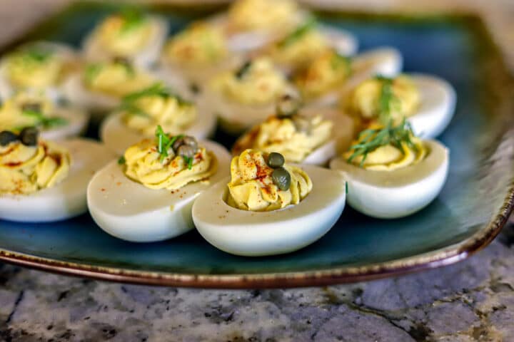 Keto deviled eggs on a blue plate