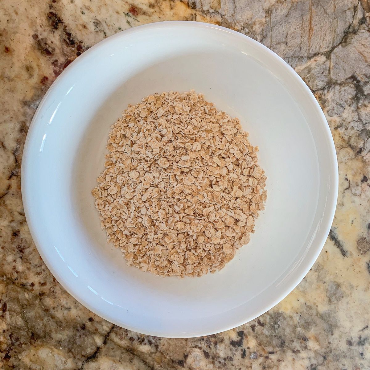 white bowl with oats