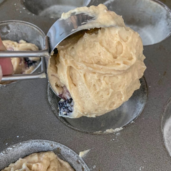 batter being added to muffin tin