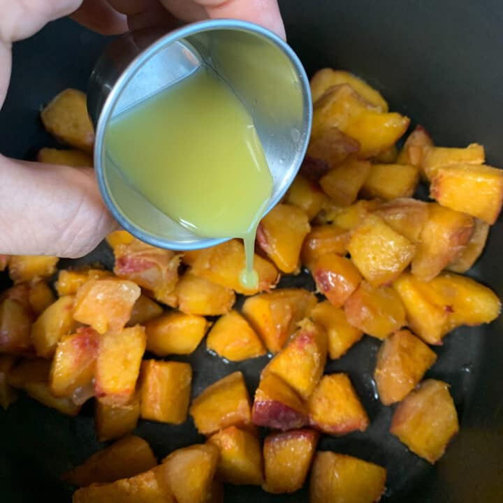 adding orange juice one chopped peaches