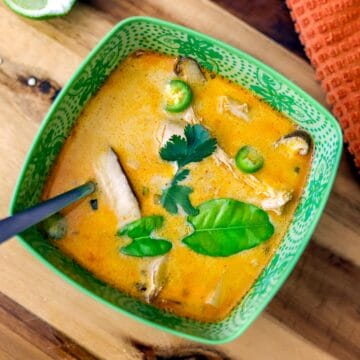 Tom Kha Gai soup in a green bowl