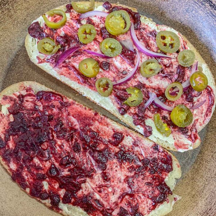 two slices of bread with chutney peppers and onions