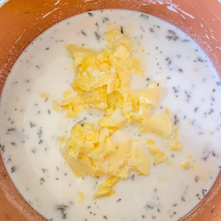 yogurt soup topped with scrambled eggs