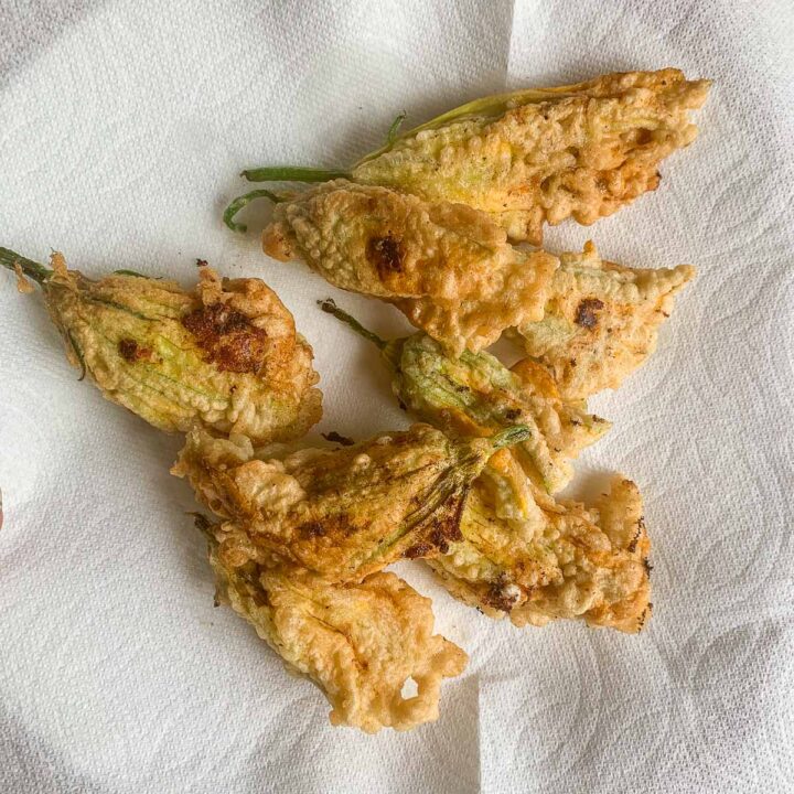 zucchini flowers draining on paper towels