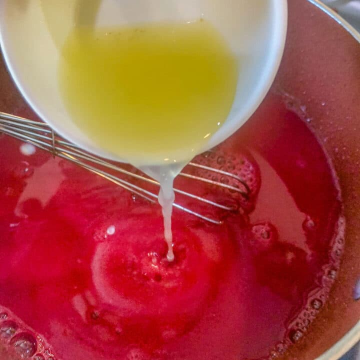 adding lemon juice to chokecherry jelly