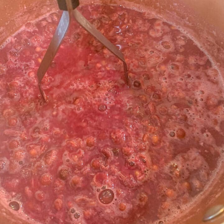 mashing chokecherries