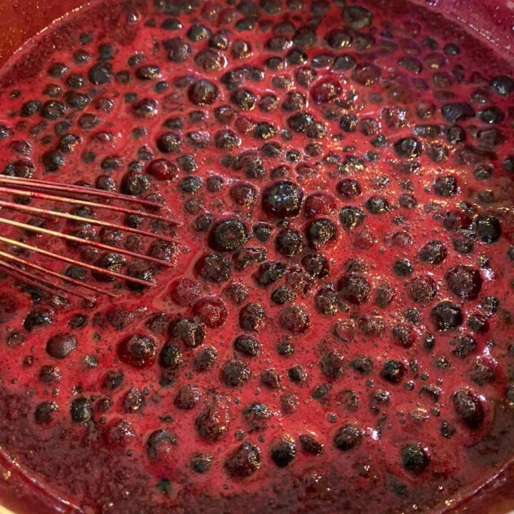 whisking a berry mixture