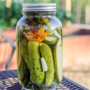 refrigerated dill pickles on a table in the garden