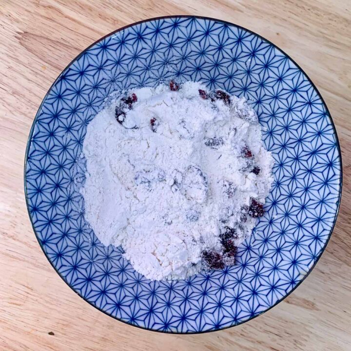blue bowl with floured dried cherries