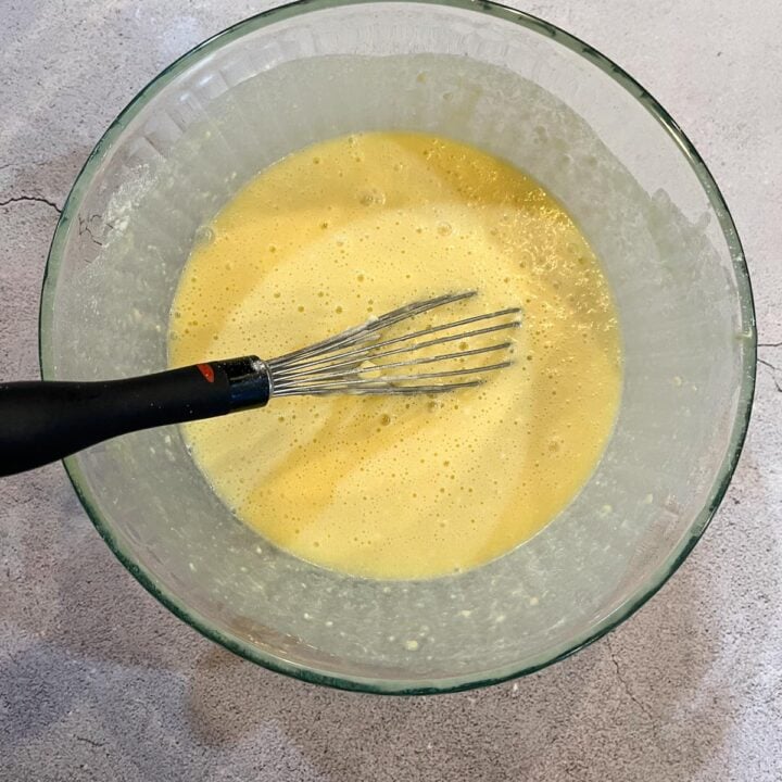 batter ingredient being batter in a glass bowl