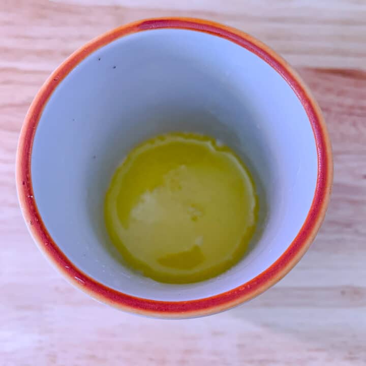 melted butter in a cup
