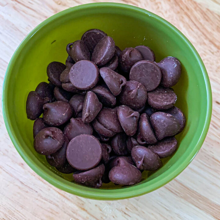 chocolate chips in a green bowl