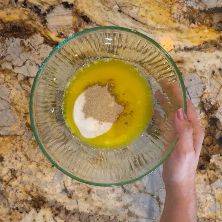 glass bowl with butter, sugar, and cardamom