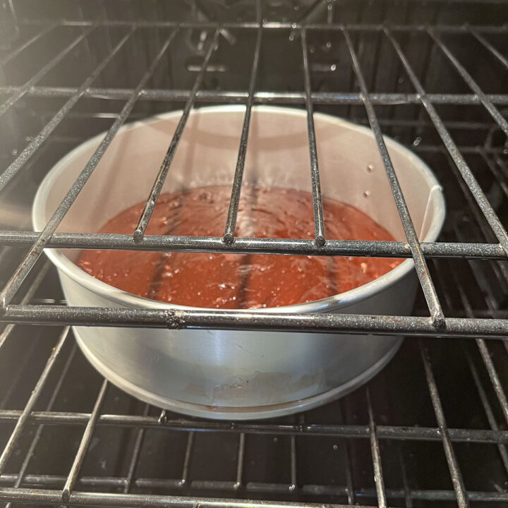 brownies mix in a round pan in the oven