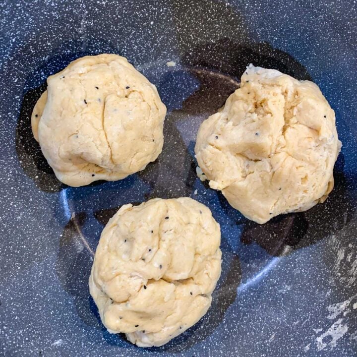 3 portions of dough in a bowl