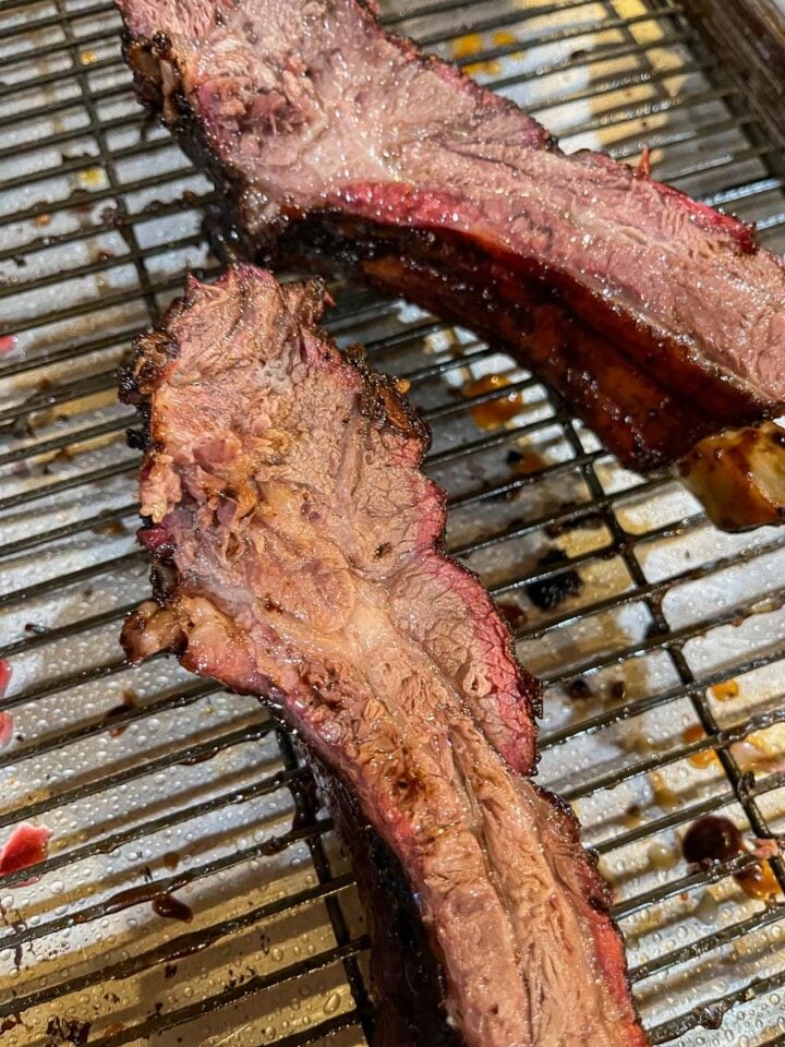 smoked beef ribs on a grill