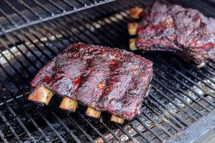 smoked beef ribs on a grill