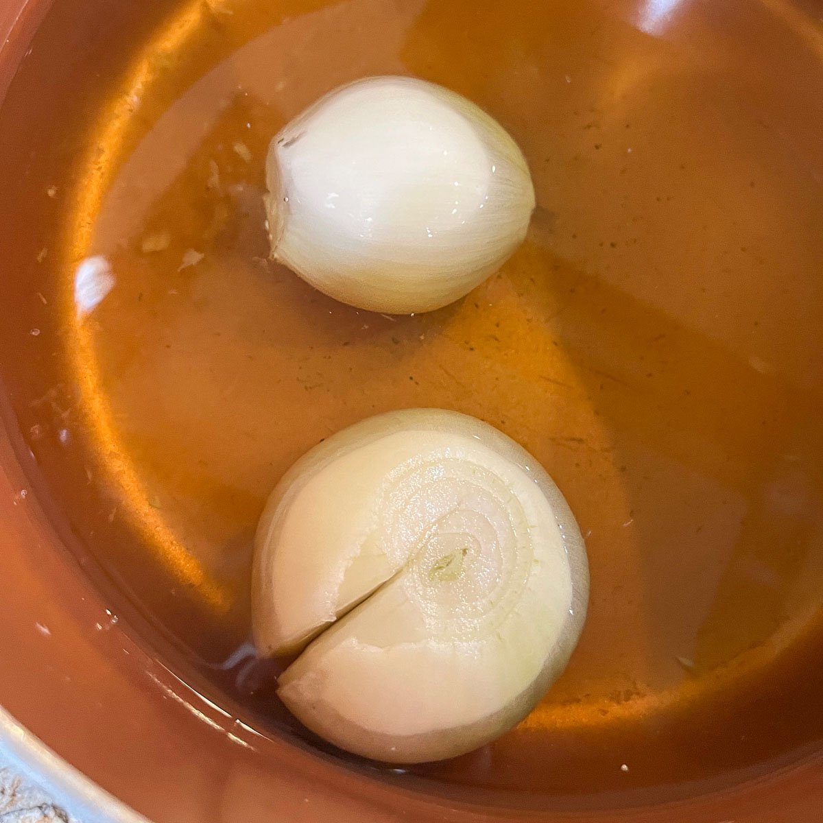 onions boiling in a pot